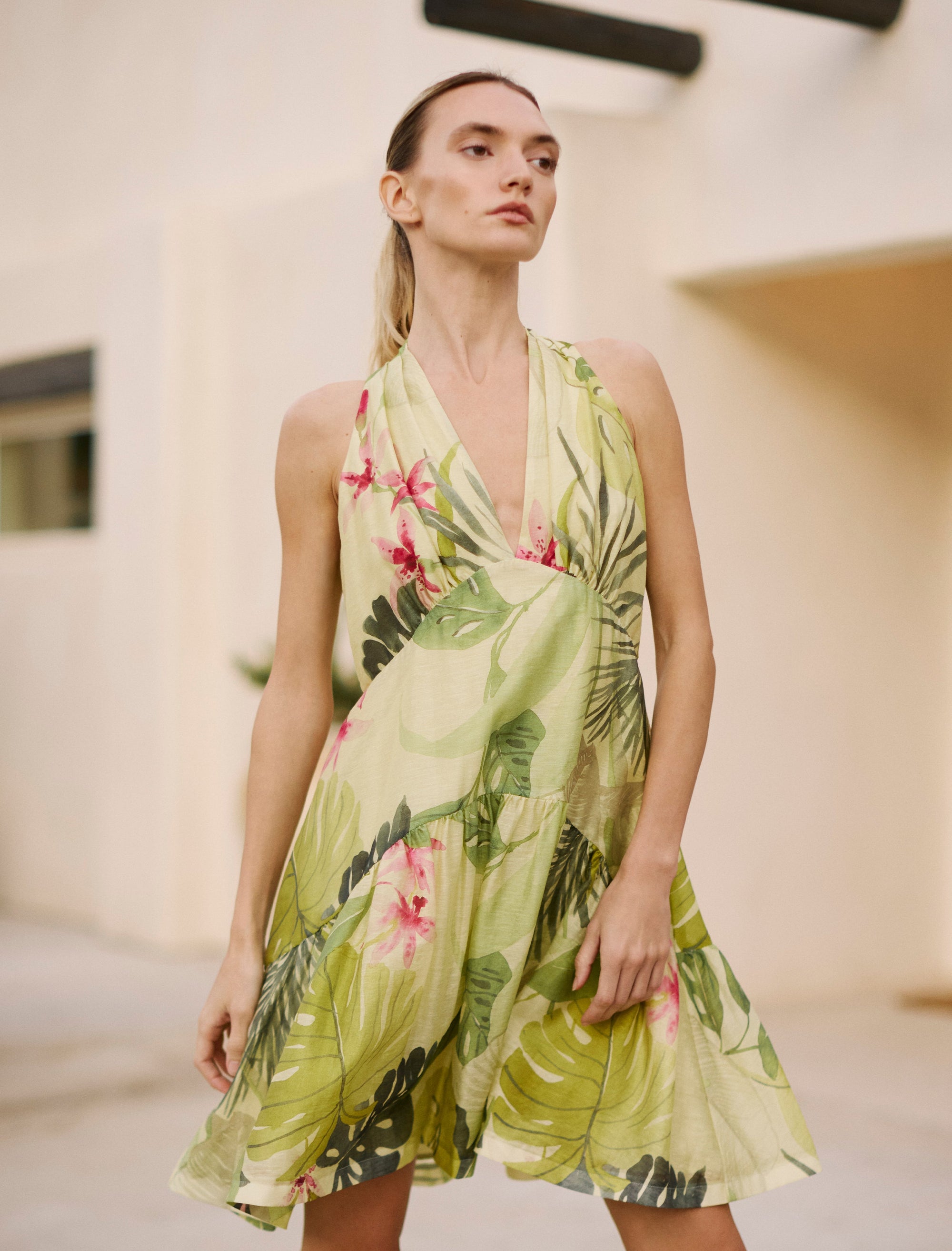 Woman wearing a floral dress with a blurred background