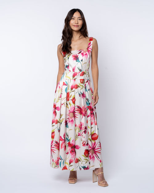 Load image 1 in gallery view. Woman wearing a floral dress on a white background