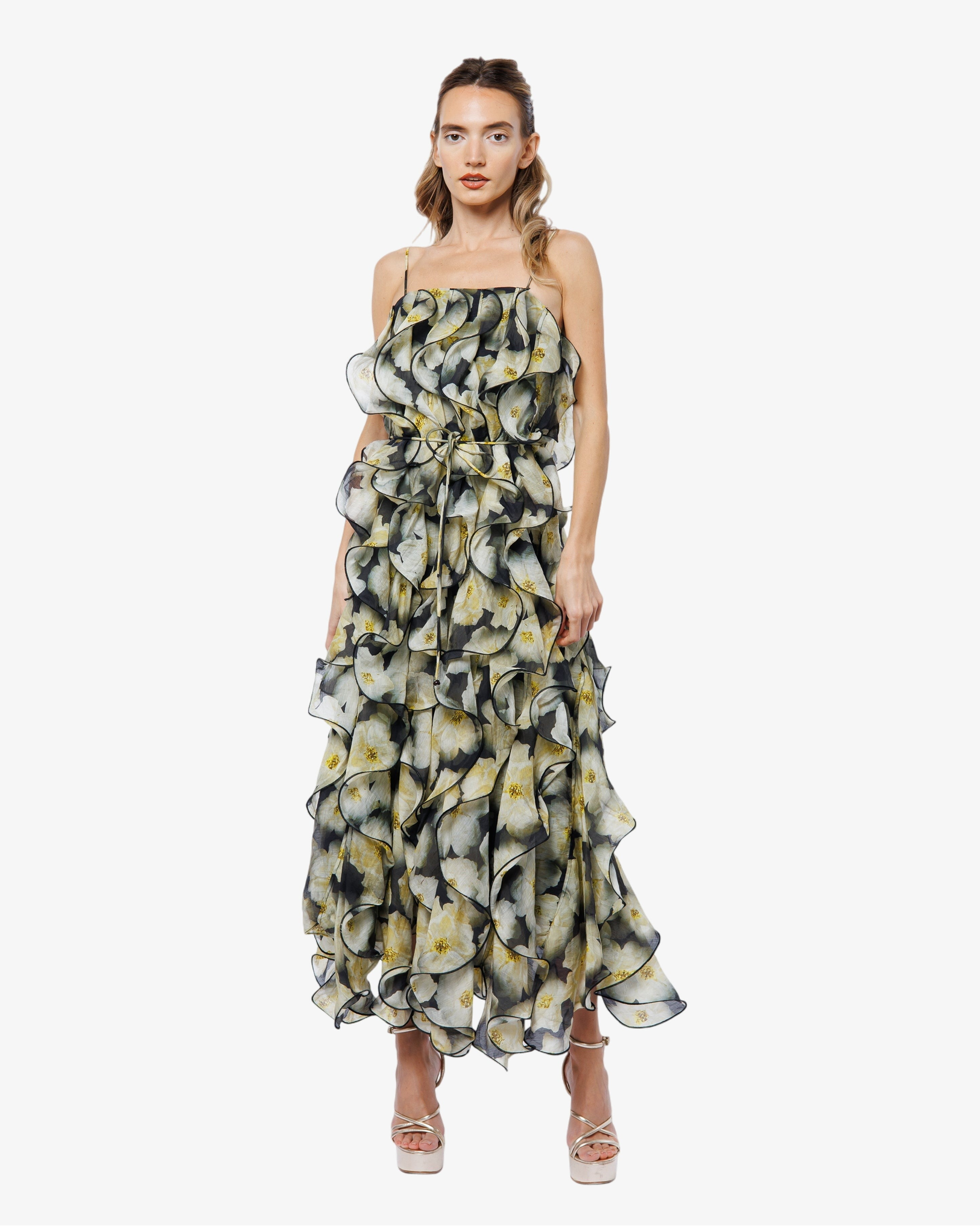 Woman wearing a floral dress on a white background