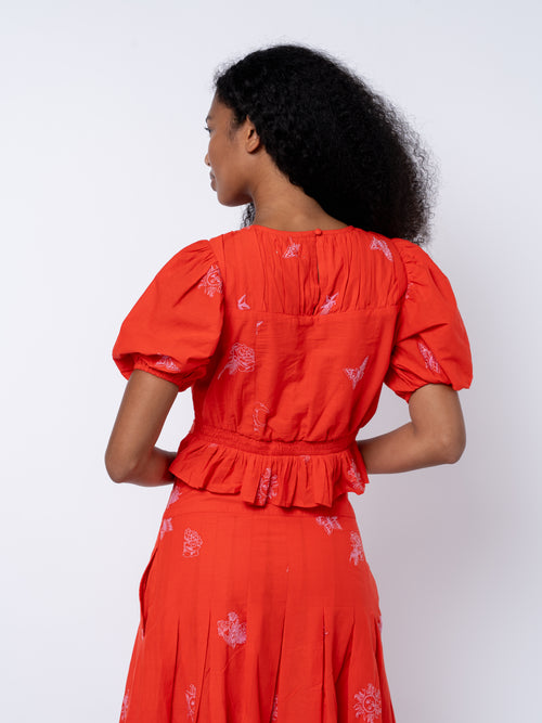 Load image 1 in gallery view. Allisa Embroidered Shirred Peplum Top