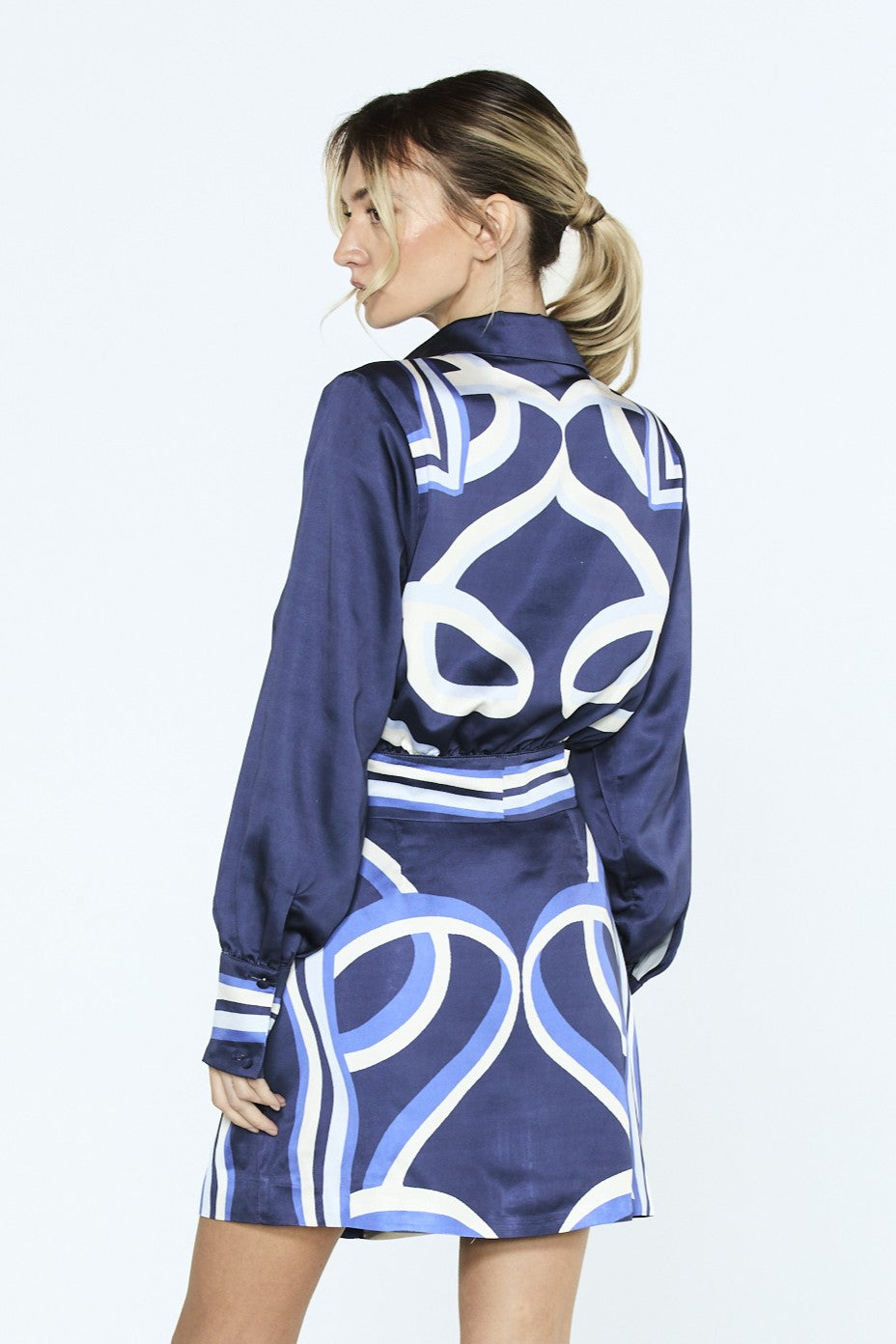 Gara Abstract Print Tie	Front Long Sleeve Top