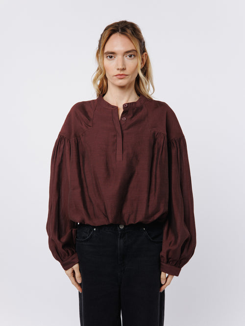 Load image 1 in gallery view. Doe Henley Bubble Hem Puff Sleeve Top