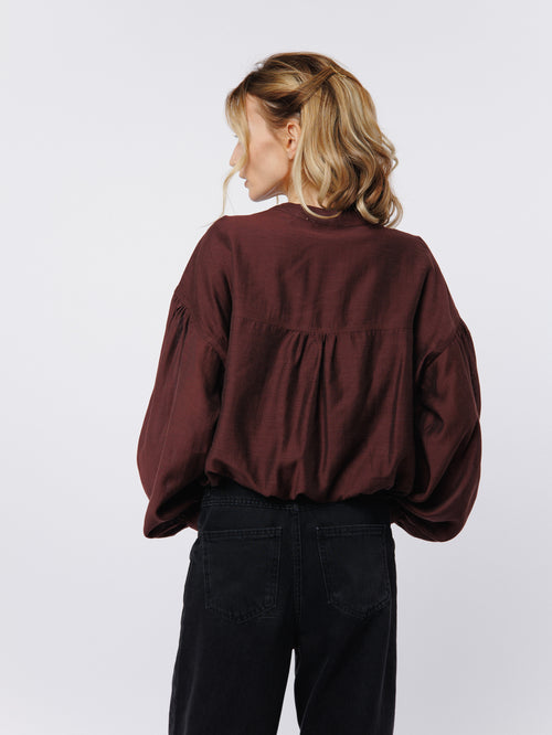 Load image 1 in gallery view. Doe Henley Bubble Hem Puff Sleeve Top