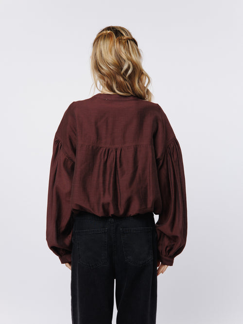 Load image 1 in gallery view. Doe Henley Bubble Hem Puff Sleeve Top